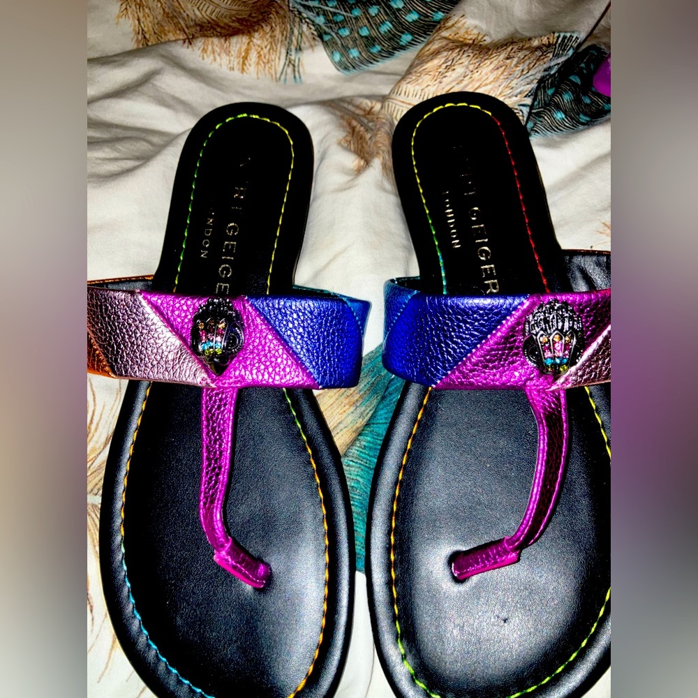 These are beautiful sandals with metallic colors like the rainbow .